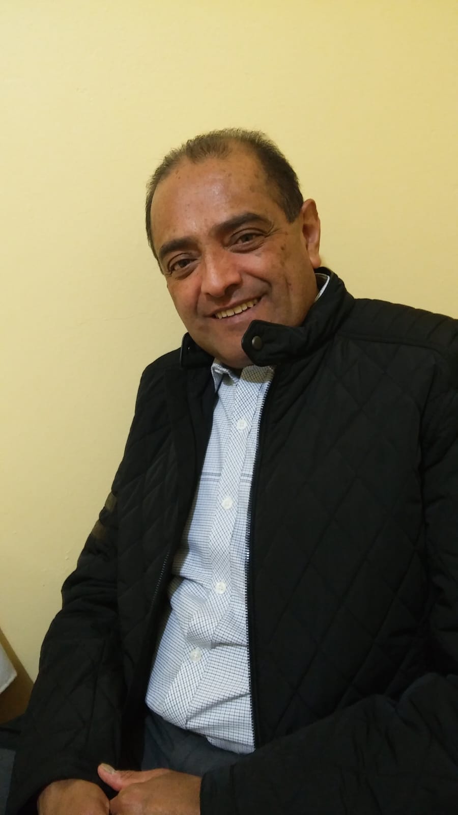 Padre Luis Salazar Santoyo sonriendo